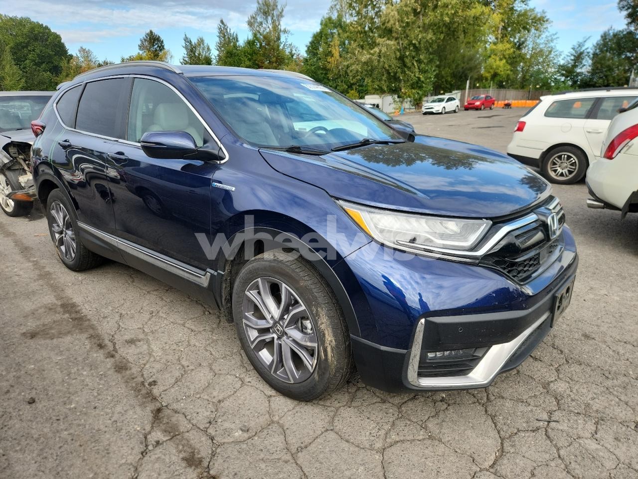 Photo 4 of 2022 HONDA CR-V TOURING (VIN 5J6RT6H92NL055120)