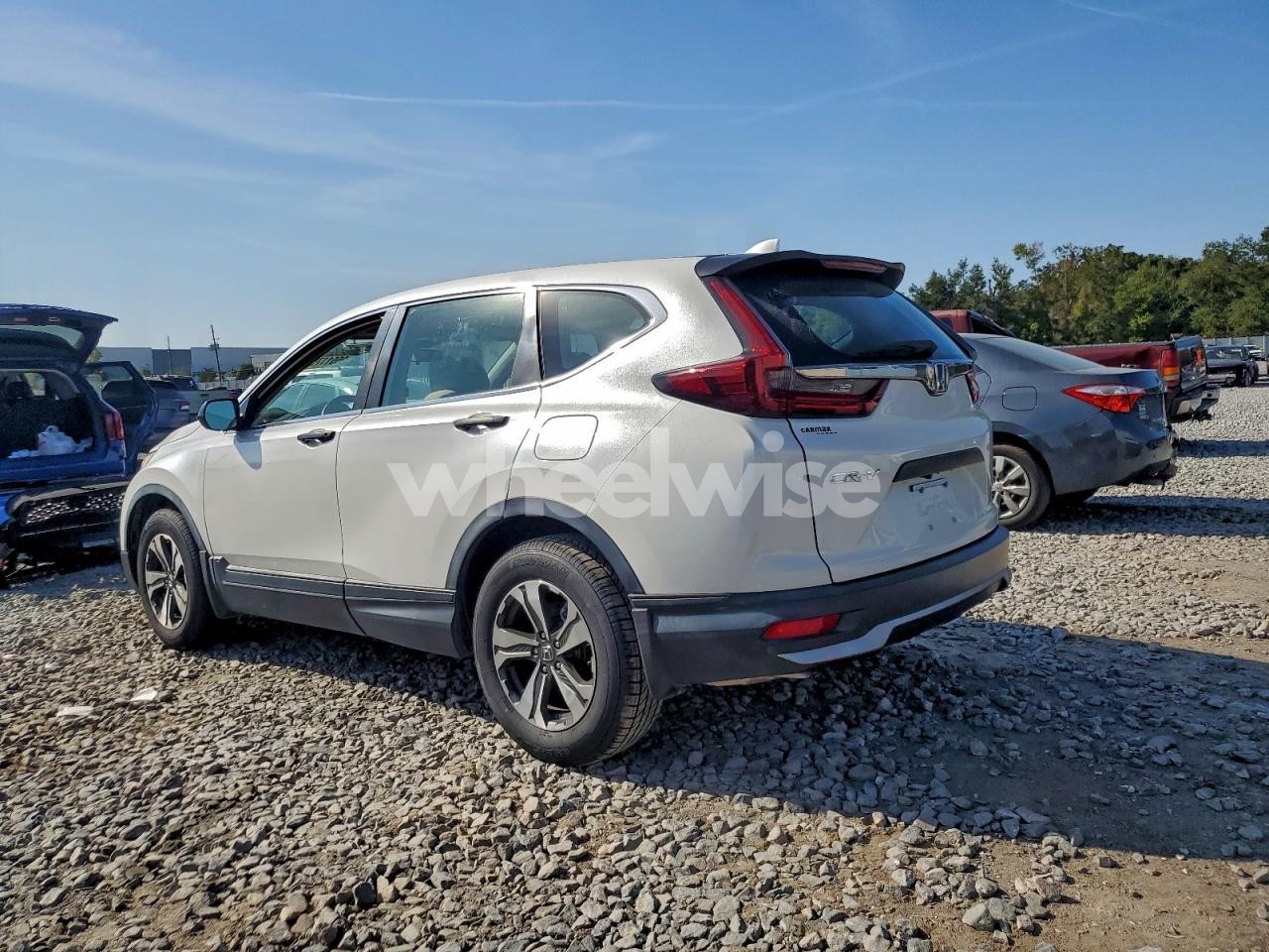 Photo 2 of 2020 HONDA CR-V LX (VIN 5J6RW1H28LA000385)