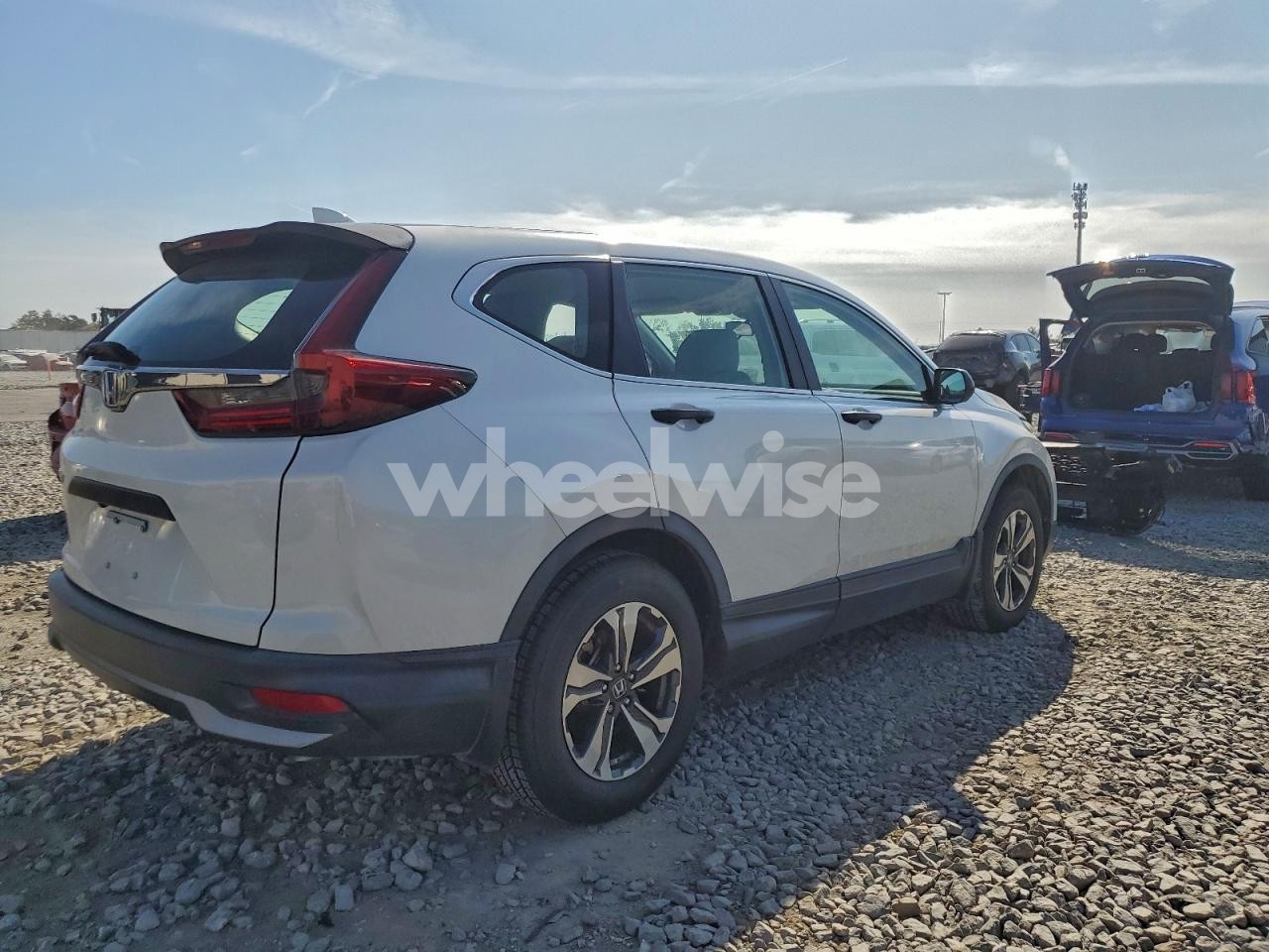 Photo 3 of 2020 HONDA CR-V LX (VIN 5J6RW1H28LA000385)