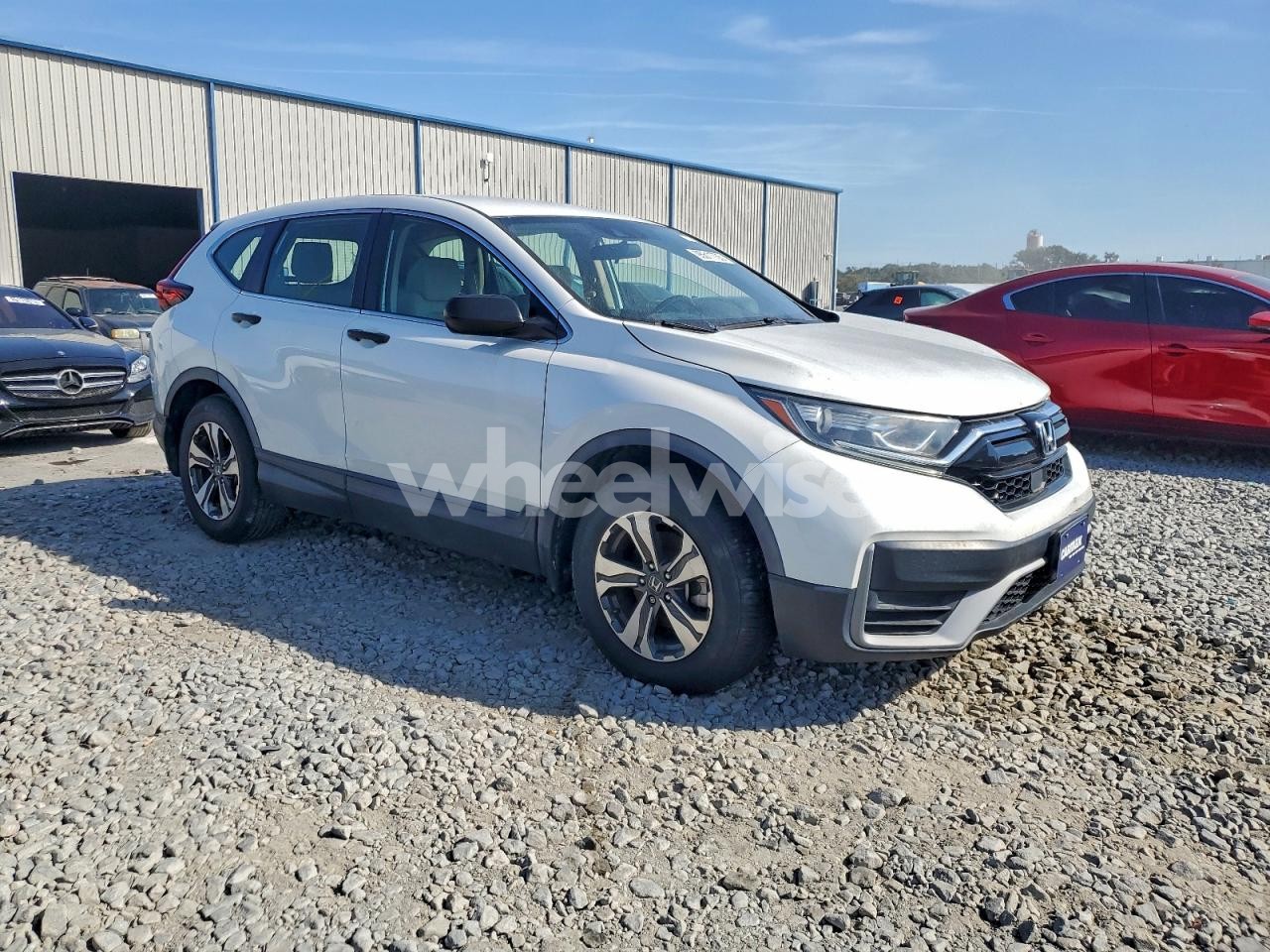 Photo 4 of 2020 HONDA CR-V LX (VIN 5J6RW1H28LA000385)