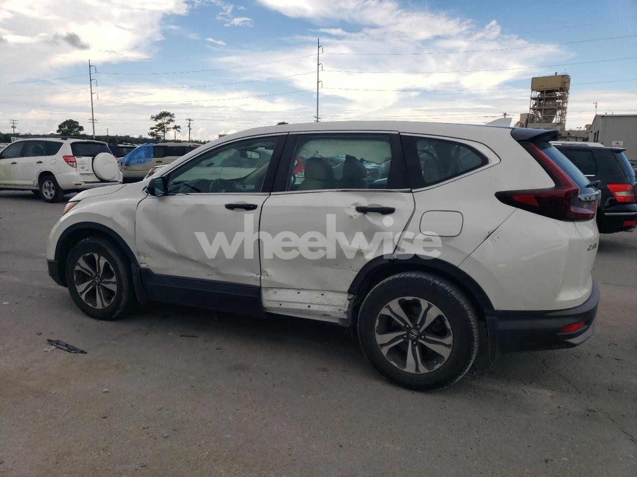 Photo 2 of 2021 HONDA CR-V LX (VIN 5J6RW1H28ML002093)