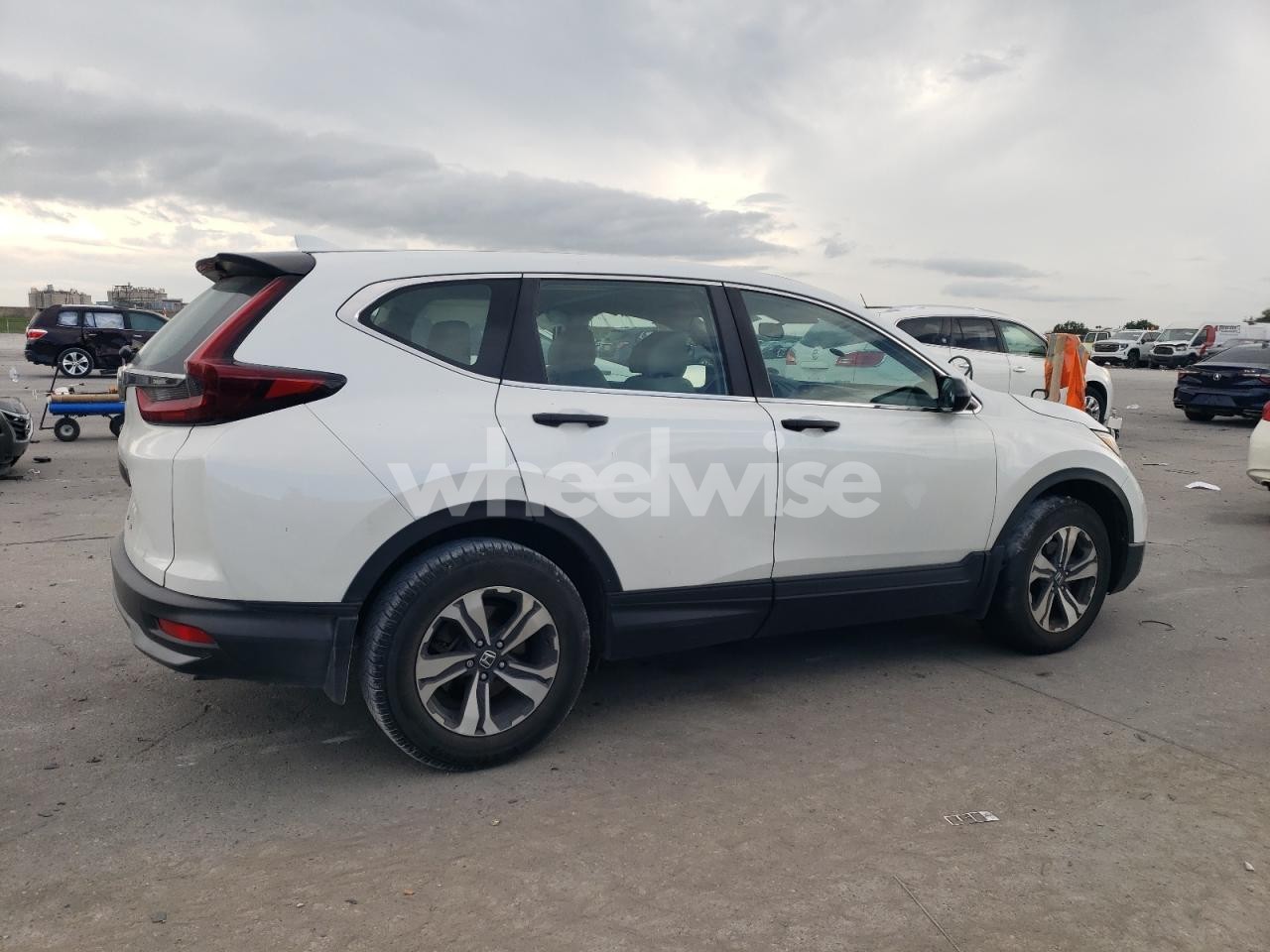 Photo 3 of 2021 HONDA CR-V LX (VIN 5J6RW1H28ML002093)