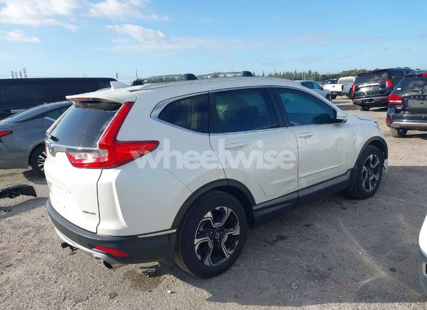 Photo 4 of 2018 Honda Cr-v TOURING (VIN 5J6RW1H92JL010764)