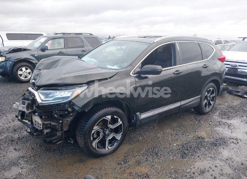Photo 2 of 2019 Honda Cr-v TOURING (VIN 5J6RW2H90KL010110)