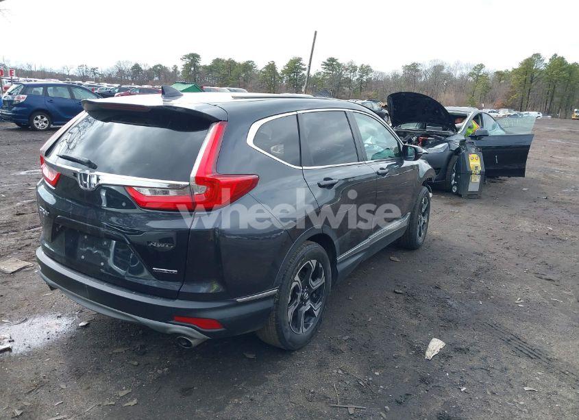 Photo 4 of 2017 Honda Cr-v TOURING (VIN 5J6RW2H91HL005474)