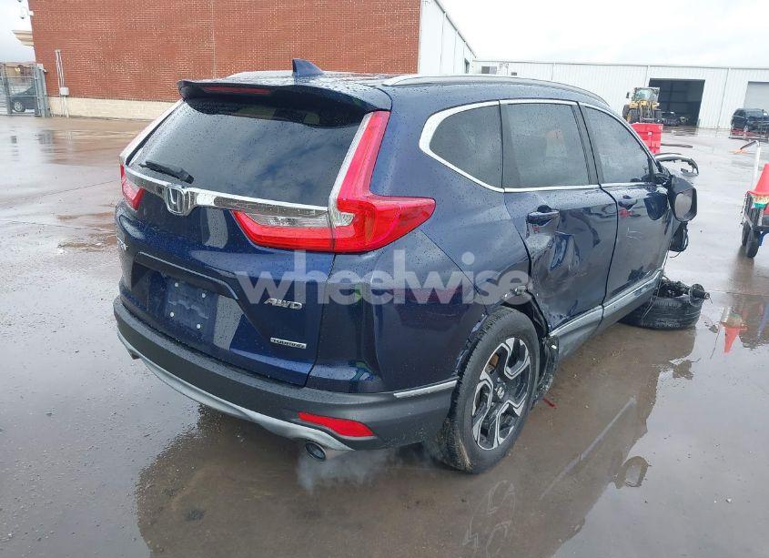 Photo 4 of 2017 Honda Cr-v TOURING (VIN 5J6RW2H95HL070599)
