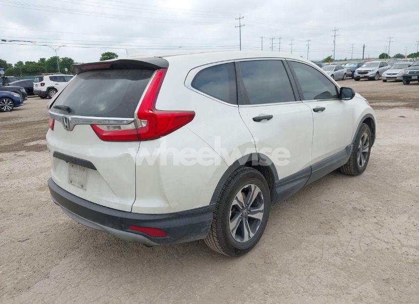 Photo 4 of 2017 Honda Cr-v LX (VIN 5J6RW5H32HL004928)
