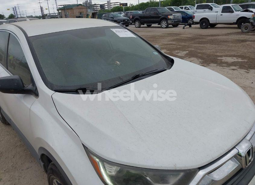 Photo 6 of 2017 Honda Cr-v LX (VIN 5J6RW5H32HL004928)