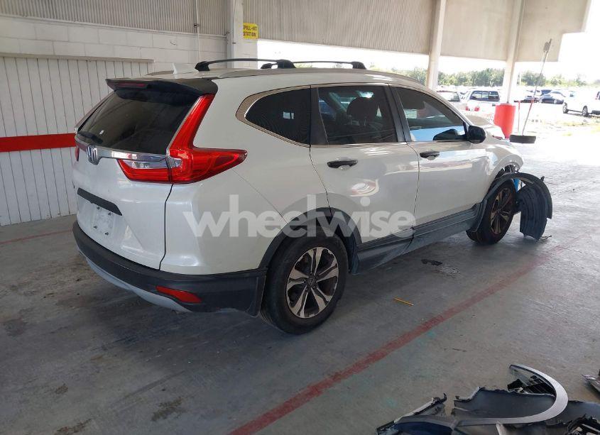 Photo 4 of 2017 Honda Cr-v LX (VIN 5J6RW5H34HL006194)