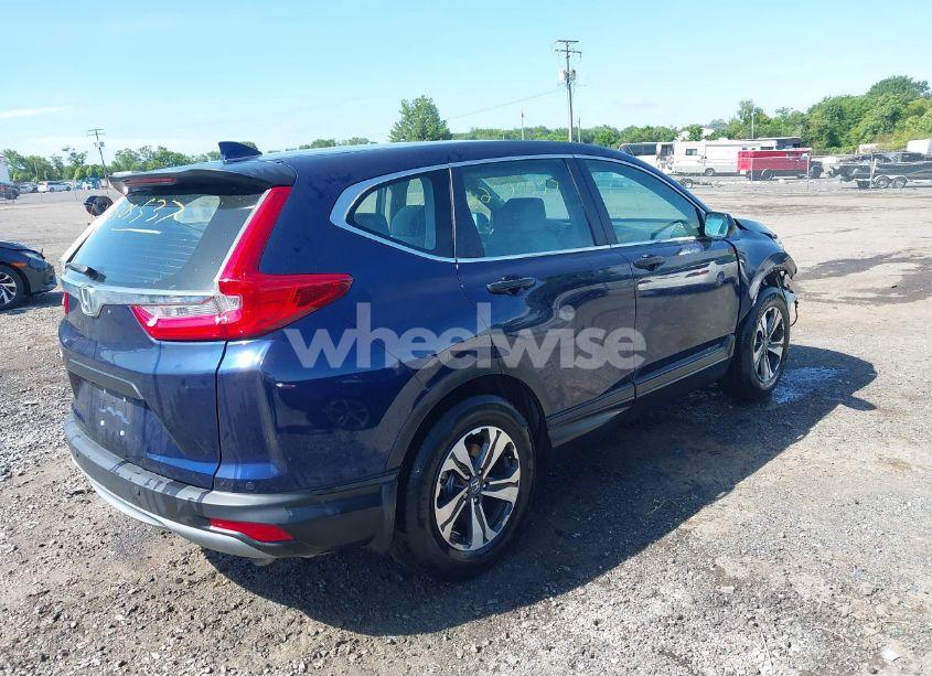 Photo 4 of 2017 Honda Cr-v LX (VIN 5J6RW5H36HL000834)