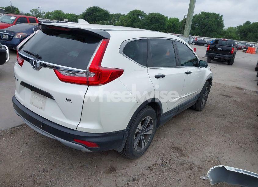 Photo 4 of 2017 Honda Cr-v LX (VIN 5J6RW5H3XHL002442)