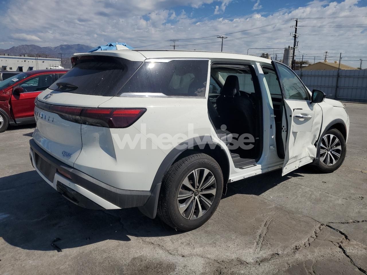 Photo 3 of 2024 INFINITI QX60 PURE (VIN 5N1DL1ER5RC350883)