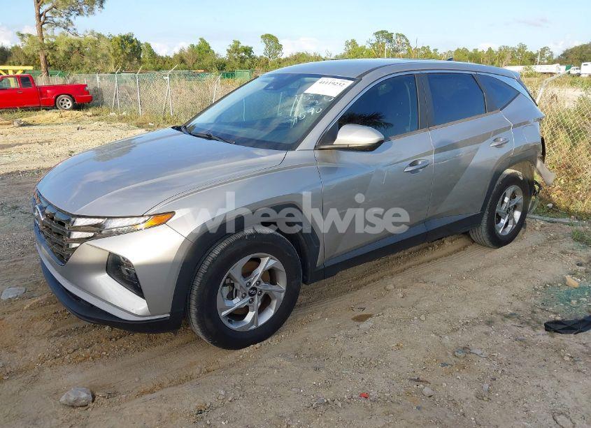 Photo 2 of 2022 Hyundai Tucson SE (VIN 5NMJA3AE7NH019598)