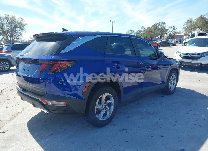 Photo 4 of 2022 Hyundai Tucson SE (VIN 5NMJA3AE8NH054070)