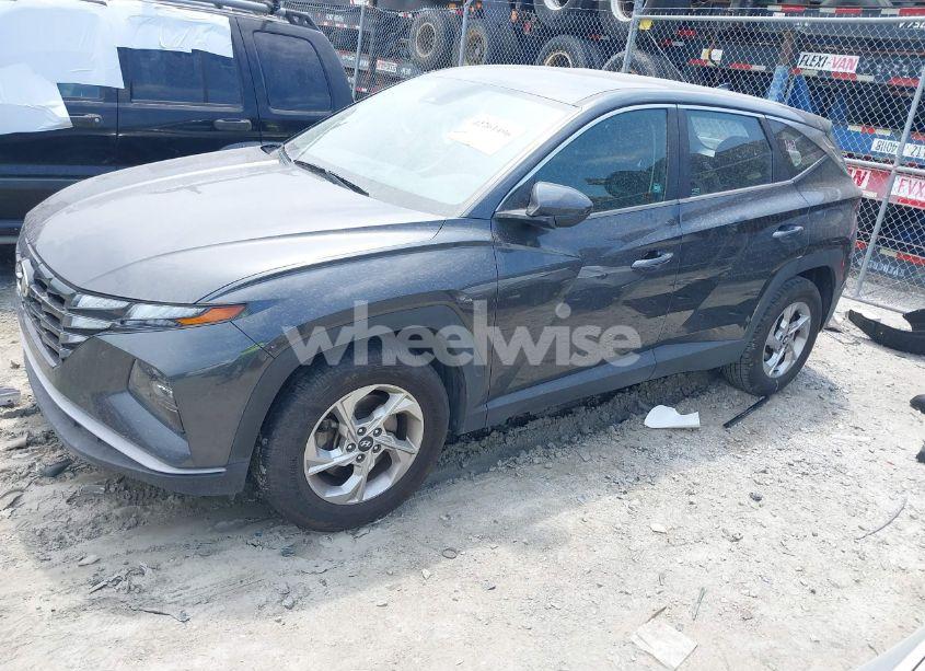 Photo 2 of 2022 Hyundai Tucson SE (VIN 5NMJA3AE9NH007081)