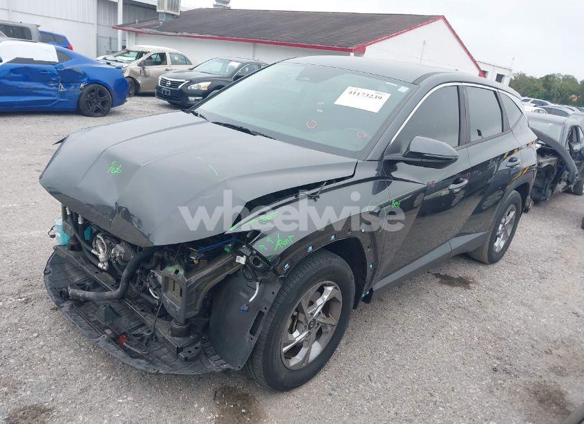 Photo 2 of 2022 Hyundai Tucson SE (VIN 5NMJA3AE9NH068012)