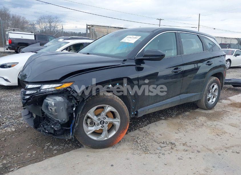 Photo 2 of 2022 Hyundai Tucson SE (VIN 5NMJACAE2NH017631)