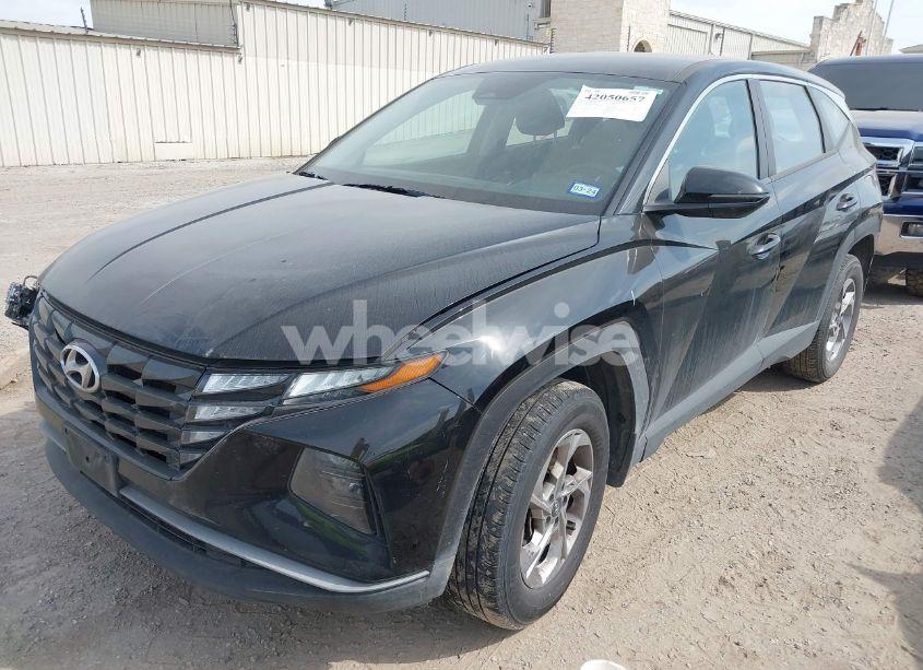 Photo 2 of 2022 Hyundai Tucson SE (VIN 5NMJACAE2NH086819)