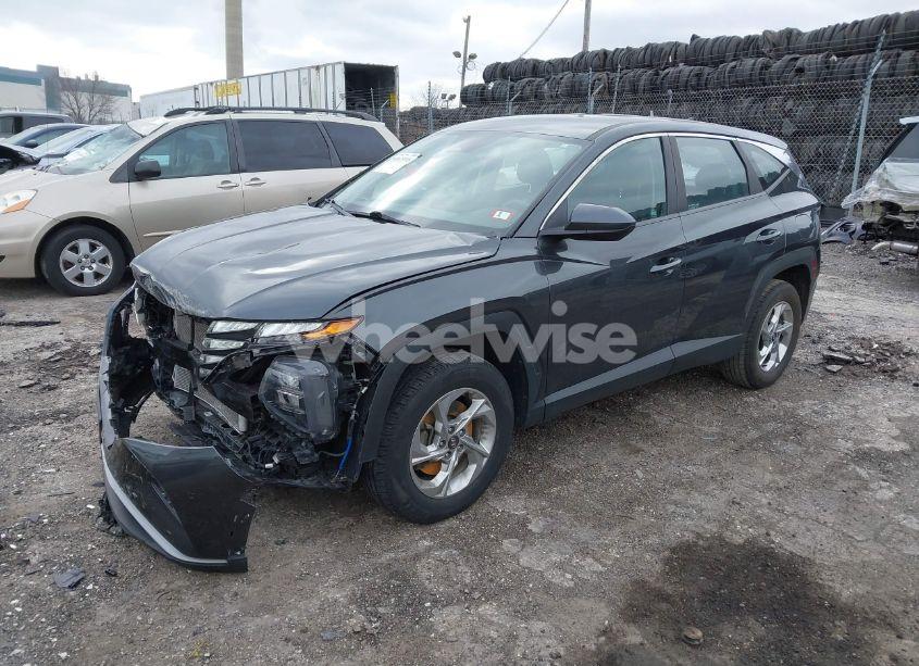 Photo 2 of 2022 Hyundai Tucson SE (VIN 5NMJACAE3NH000434)