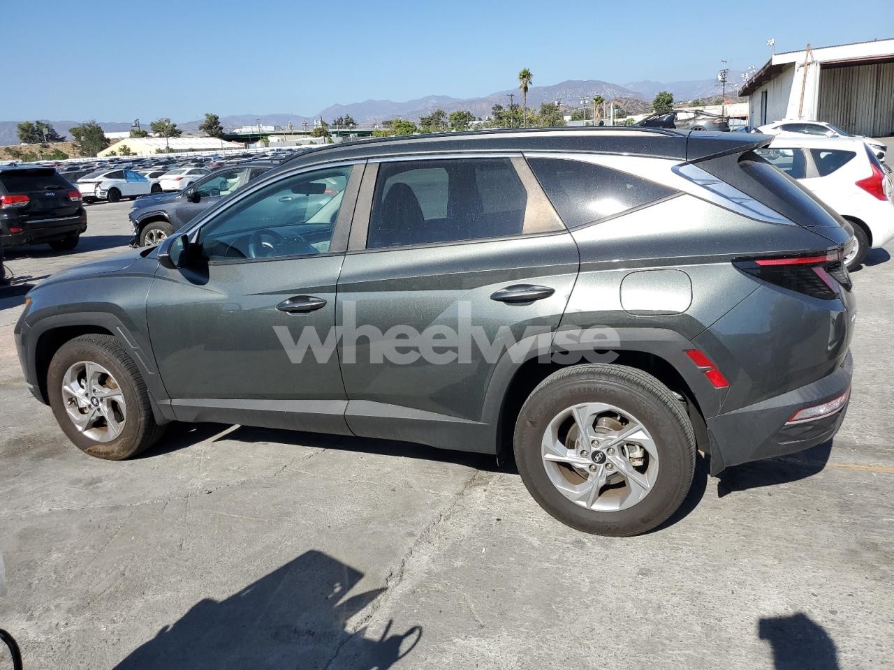 Photo 2 of 2023 HYUNDAI TUCSON SEL (VIN 5NMJBCAE4PH239815)