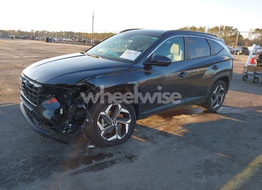 Photo 2 of 2022 Hyundai Tucson SEL (VIN 5NMJCCAE4NH039964)