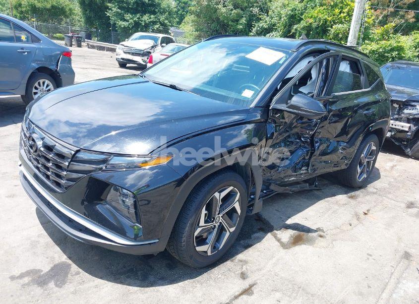 Photo 2 of 2022 Hyundai Tucson SEL (VIN 5NMJCCAE5NH061293)