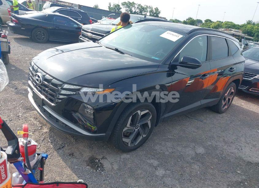 Photo 2 of 2022 Hyundai Tucson SEL (VIN 5NMJFCAE4NH147735)