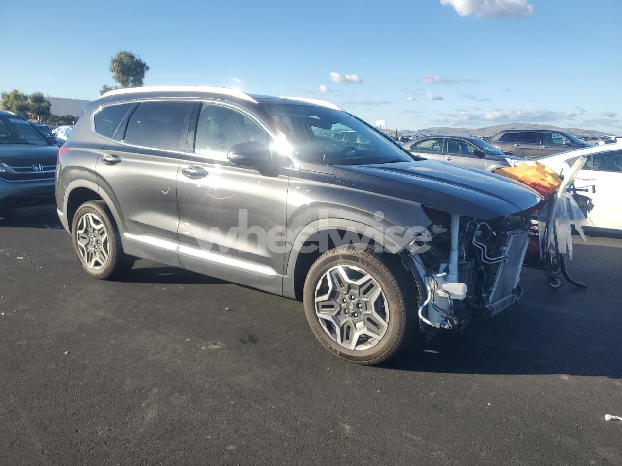 Photo 4 of 2023 HYUNDAI SANTA FE LIMITED (VIN 5NMS5DA16PH001950)