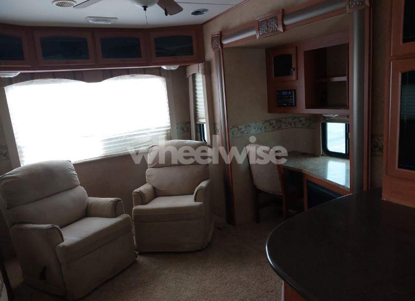 Photo 10 of 2011 Heartland 34qsrl (VIN 5SFRG3728BE220520)