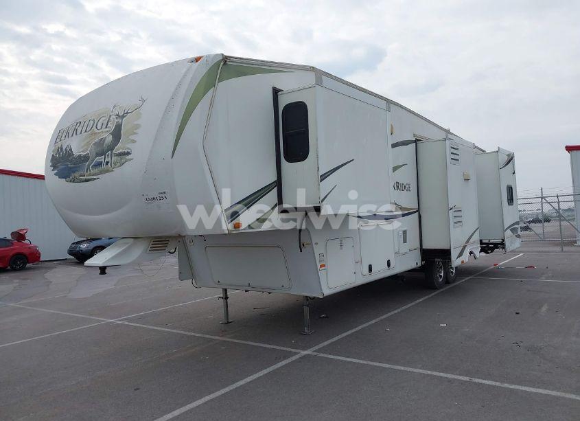 Photo 2 of 2011 Heartland 34qsrl (VIN 5SFRG3728BE220520)