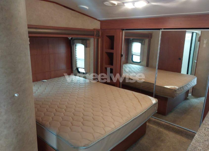 Photo 5 of 2011 Heartland 34qsrl (VIN 5SFRG3728BE220520)