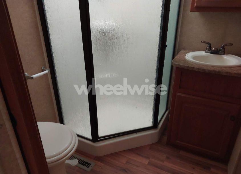 Photo 6 of 2011 Heartland 34qsrl (VIN 5SFRG3728BE220520)