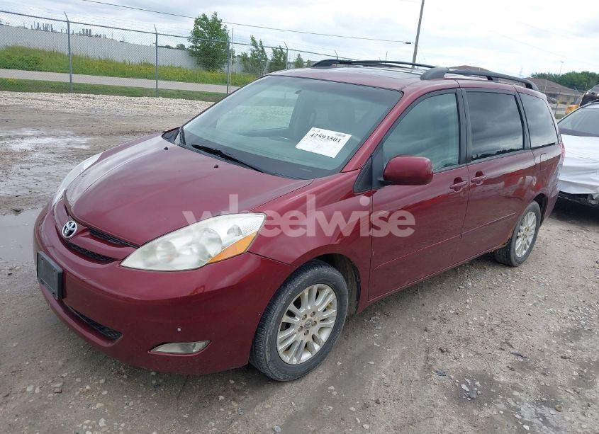 Photo 2 of 2010 Toyota Sienna XLE (VIN 5TDYK4CC9AS328039)
