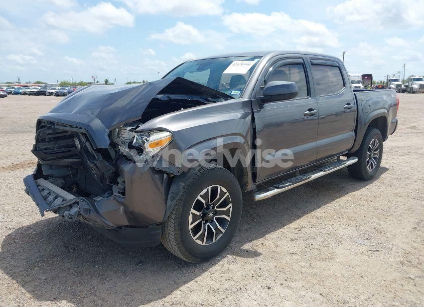 Photo 2 of 2018 Toyota Tacoma SR (VIN 5TFAX5GN0JX104673)