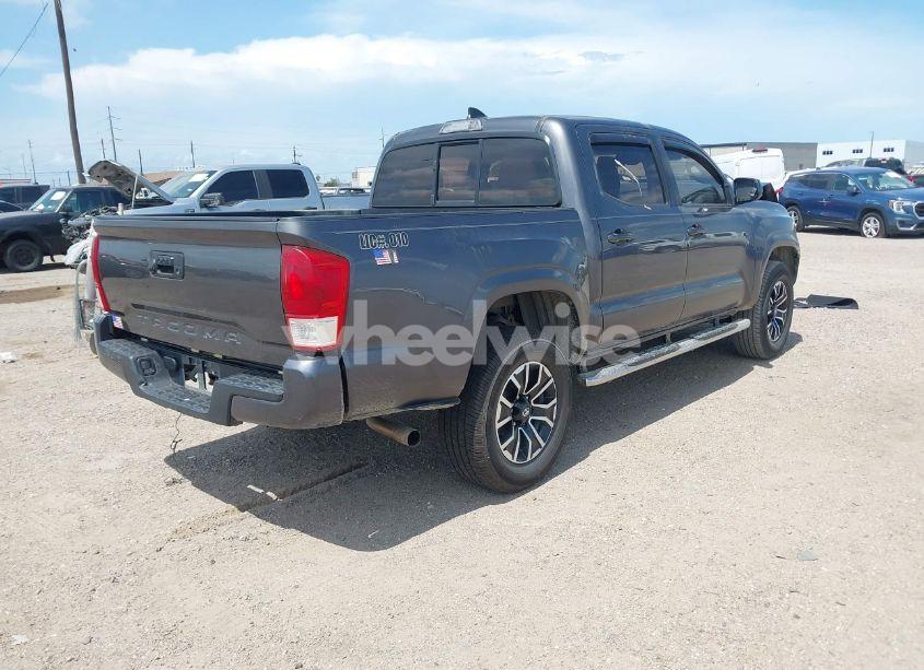 Photo 4 of 2018 Toyota Tacoma SR (VIN 5TFAX5GN0JX104673)