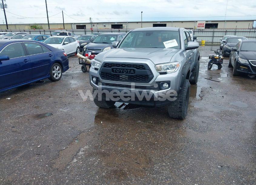 Photo 2 of 2020 Toyota Tacoma SR (VIN 5TFAX5GN1LX184813)