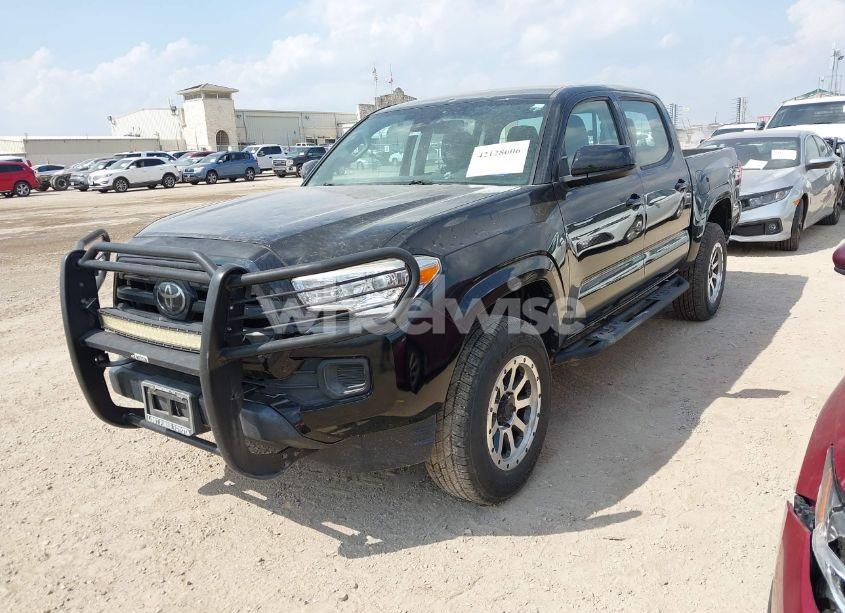 Photo 2 of 2018 Toyota Tacoma SR (VIN 5TFAX5GN4JX129995)