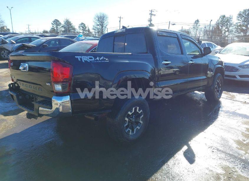 Photo 4 of 2018 Toyota Tacoma SR V6 (VIN 5TFCZ5ANXJX124991)