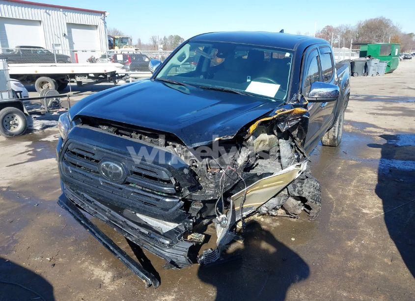 Photo 6 of 2018 Toyota Tacoma SR V6 (VIN 5TFCZ5ANXJX124991)