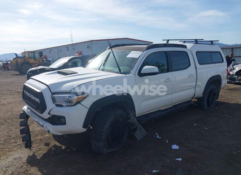 Photo 2 of 2016 Toyota Tacoma SR5 (VIN 5TFDZ5BN0GX002152)