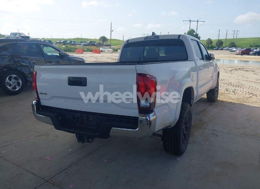 Photo 4 of 2021 Toyota Tacoma SR5 V6 (VIN 5TFDZ5BN2MX058444)