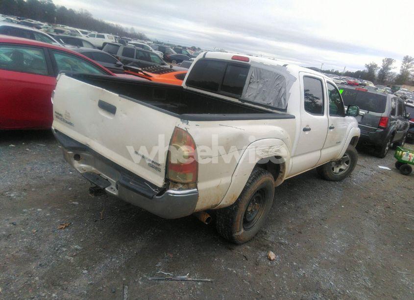Photo 4 of 2011 Toyota Tacoma DOUBLE CAB (VIN 5TFJX4GNXBX002051)