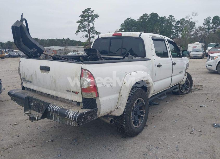 Photo 4 of 2013 Toyota Tacoma DOUBLE CAB (VIN 5TFLU4EN6DX077823)