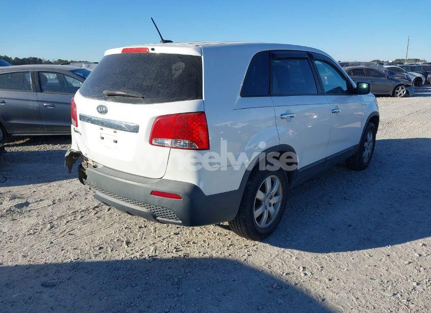 Photo 4 of 2011 Kia Sorento (VIN 5XYKT3A12BG012740)