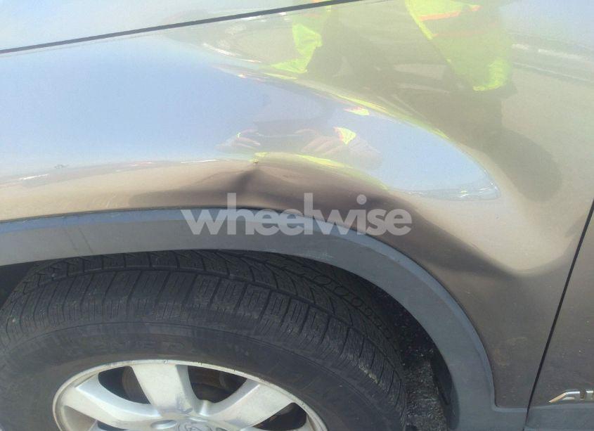 Photo 6 of 2011 Kia Sorento LX V6 (VIN 5XYKTDA28BG124828)