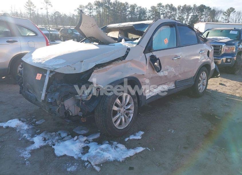 Photo 2 of 2011 Kia Sorento EX V6 (VIN 5XYKU4A20BG112489)