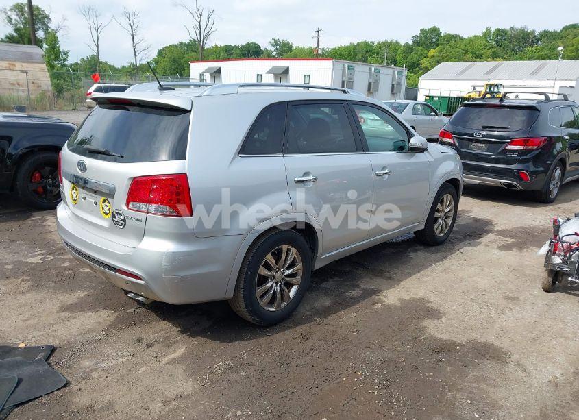 Photo 4 of 2011 Kia Sorento SX V6 (VIN 5XYKW4A24BG093102)
