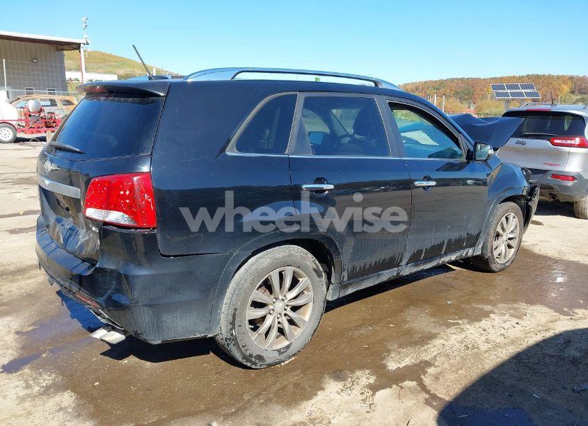 Photo 4 of 2011 Kia Sorento SX V6 (VIN 5XYKW4A25BG128679)