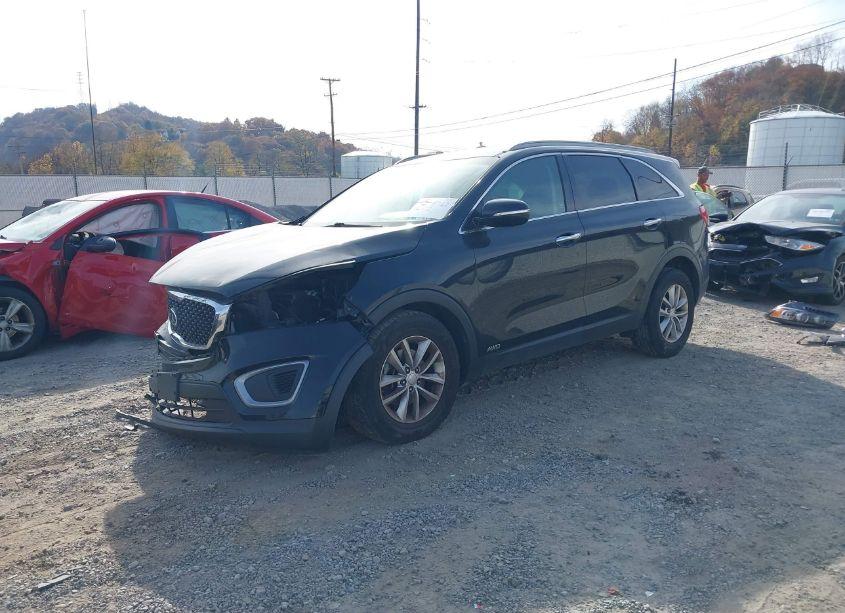 Photo 2 of 2016 Kia Sorento LX/L (VIN 5XYPGDA34GG047515)