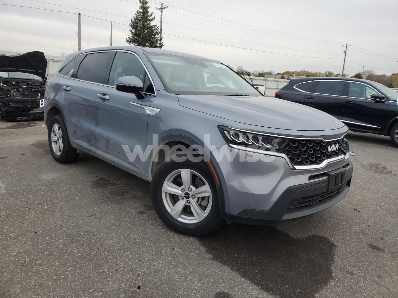 Photo 4 of 2023 KIA SORENTO LX (VIN 5XYRGDLC6PG170349)